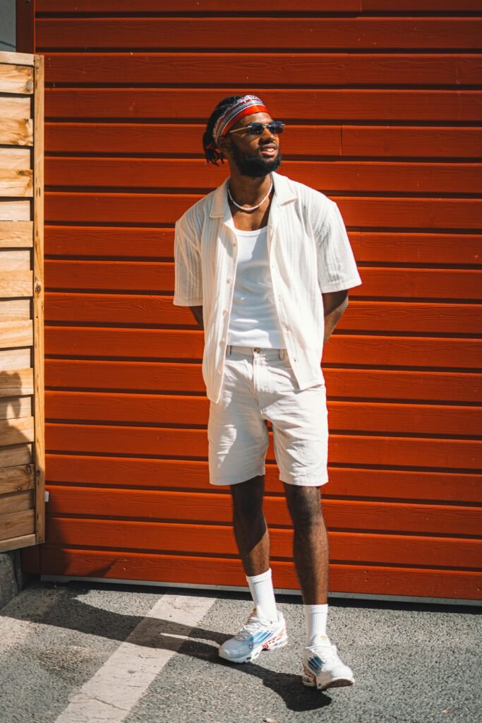 Monochrome white linen summer outfit for men with tailored shorts